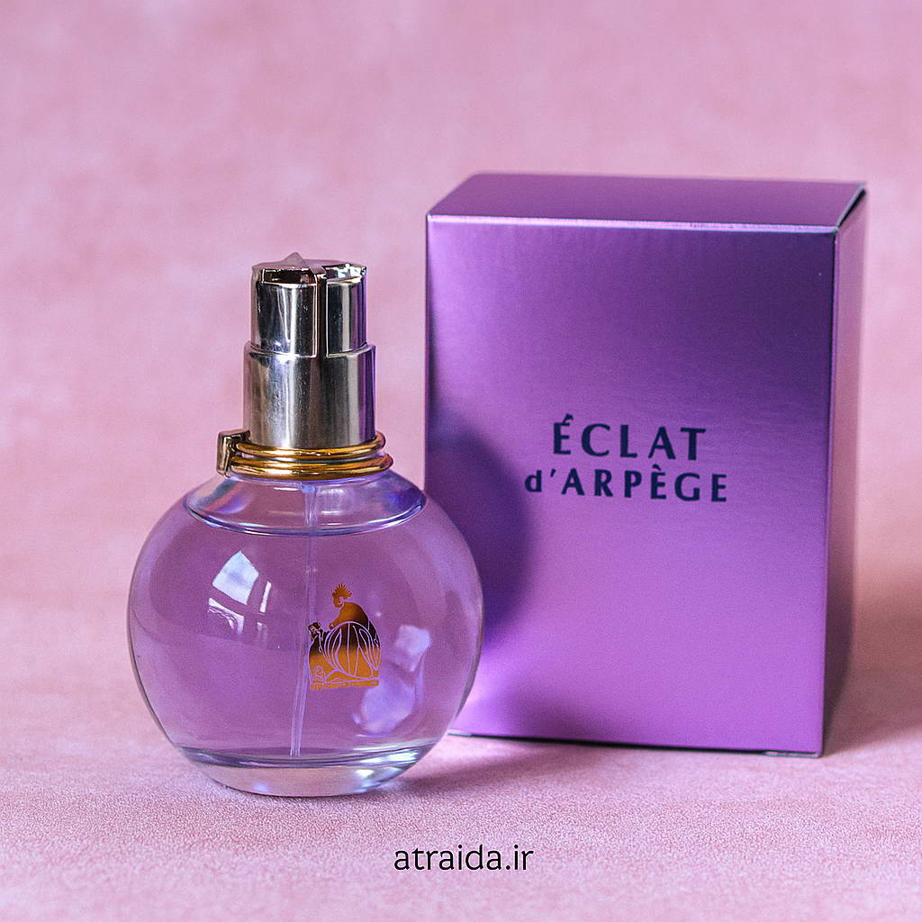 این تصویر یک نمای طبیعی و باکیفیت از عطر زنانه اکلت (Éclat d’Arpège) و قیمت عطر اکلت رو نشون می‌ده برچسب "atraida.ir" مالکیت عطر آیدا ( امیر عطری) پایین تصویر دیده می‌شه