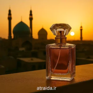 تصویر ادکلن زنانه قم با طراحی شیشه‌ای صورتی و درب طلایی الماسی‌شکل و برچسب atraida.ir هویت برند فروشگاه عطر آیدا
